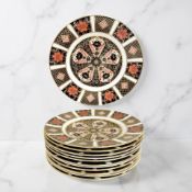 A set of twelve Royal Crown Derby Imari porcelain side plates, pattern 1128, diameter 16cm.