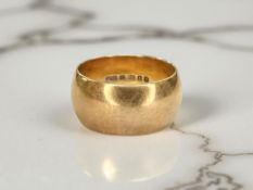 An 18ct yellow gold band ring, size I CONDITION REPORT: 8.6g.