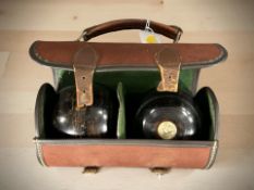 A pair of Jaques & Son bias no. 3 lawn bowls in carry bag.