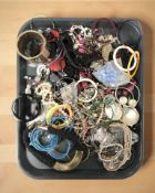 A quantity of costume jewellery, bangles,