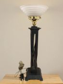 A contemporary wooden table lamp,