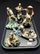 A group of oriental ceramic glazed figures including musicians,