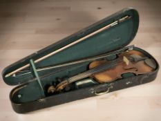 An early 20th century violin with two-piece 14