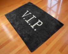 An Indian wool rug 'VIP', 140 cm x 198 cm.