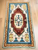 An eastern woolen rug, 170 cm x 93 cm.