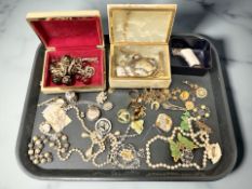 A group of costume jewellery, wristwatches,