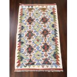 A Chobi Kilim rug, 93 cm x 64 cm.