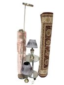 A contemporary chrome and glass lamp table, a pair of table lamps, a standard lamp,