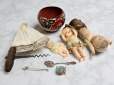 Four small antique dolls, a Hungarian Zsolnay bowl, Victorian corkscrew,