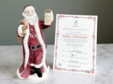 A Royal Worcester figure, Father Christmas, limited edition numbered 296 of 4,950, with certificate.