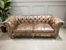 A contemporary Barker & Stonehouse three seater Chesterfield club settee,