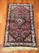 A Hamadan rug, North-West Iran, 182 cm x 108 cm.