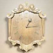 An Hermle continental beech wall clock, height 41 cm. CONDITION REPORT: No weights.