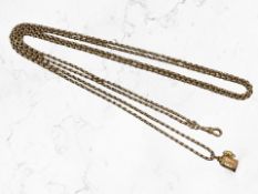 An antique 9ct yellow gold muff chain,