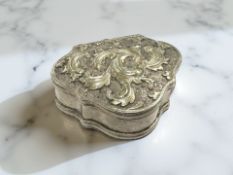An 18th century silver-gilt cartouche-shaped snuff box,