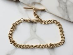 A 9ct yellow gold Albert chain with T-bar, length 23.5 cm. CONDITION REPORT: 20.