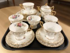 Twenty one pieces of Royal Crown Derby vine tea china.