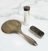 A silver-backed dressing table mirror, length 27.