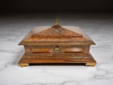An early-20th century pollard oak silk-lined freedom casket,