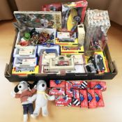 A collection of toys including Corgi die cast models in boxes, Snoopy soft toys, etc.