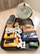 A table globe, a Tri-Ang clockwork car, two Lone Star detective spudmatic guns,