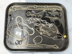 A group of costume jewellery including black glass necklace,