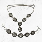 A Continental white metal bracelet set with crystal, mounted in Sterling silver, length 16 cm,