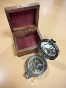A reproduction natural sine compass in brass mounted hardwood box.