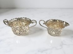 A Victorian silver sugar bowl and matching cream jug,