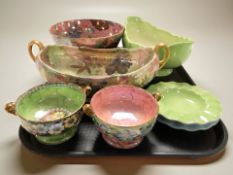A group of Maling lustre wares including fruit bowls, twin handled bowls, ash trays, etc.