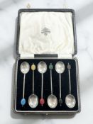 A set of six silver coffee spoons, cased.