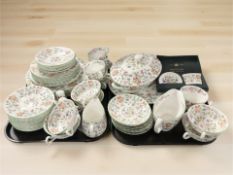 Approximately fifty nine pieces of Minton Haddon Hall tea and dinner porcelain.