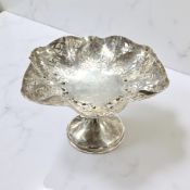 A Geroge V pierced-silver pedestal tazza, H J Cooper & Co Ltd, Birmingham 1933, diameter 23cm.