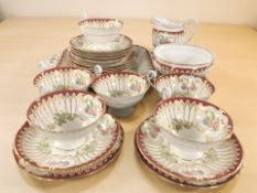Twenty one pieces of Royal Worcester tea china pattern 1562.