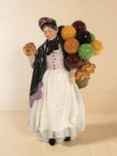 A Royal Doulton figure 'Biddy Pennyfarthing' HN1843.