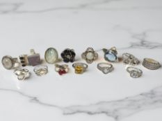 Fourteen Sterling silver / un-marked white metal dress rings.