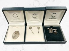 A pair of Ola Gorie Scottish designer silver jewellery to include a pair of earrings, a brooch,