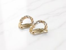 A pair of clip-on earrings, stamped 585, diameter 2.5cm CONDITION REPORT: 2.