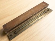 A Hall Harding Limited, London, lacquered brass rolling rule, length 61 cm, with mahogany box.