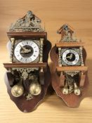Two reproduction Dutch-style wall clocks with pear drop weights, largest 60 cm high.