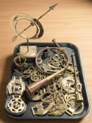 A quantity of antique horse brasses, miniature mortar and pestle, sun dial, copper and brass horn.