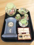 A Wedgwood blue jasperware quartz mantel timepiece, a small Royal Crown Derby knife in case,