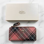 A Vivian Westwood purse with box,