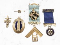 A group of Masonic jewels to include a silver-gilt ball pendant, a silver and enamel Durham badge,