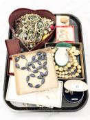 A collection of costume jewellery, silver filigree brooch, items by Moda, Enigma,