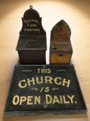 Two church donation boxes and a further sign, width 48 cm.