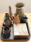A collection of studio pottery wares including vases, jugs, rectangular section vessel.
