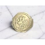 A 9ct gold signet ring with inset St George coin, size U CONDITION REPORT: 4.