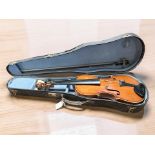 A 20th century violin with two piece 14" back, in case with bow.