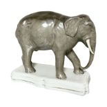 A rare Victorian Staffordshire pottery figure of Jumbo the Elephant, standing on oblong plinth,